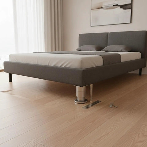 Adjustable Stainless Steel Furniture Legs 1.5 To 9.8 Inch Leveling Feet under bed on wooden floor with mounting screws visible.