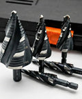 Four Spiral Flute Step Drill Bit Set From Eighth Inch To One And Three Eighths Inch Five Pieces HSS Unibits displayed in front of a case