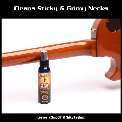 Guitar One All In One Cleaner Polish And Wax For Electric Acoustic And Bass Guitars 4 Oz White bottle beside guitar neck