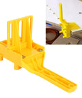 Rock Solid Doweling Jig Kit 38 Piece Self Centering Woodworking Drill Guide with yellow plastic construction for precise hole drilling.