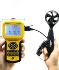 Front view of HVAC Anemometer And Digital Airflow Tester With Backlit Display For Pro Grade Wind Speed Measurement Air Velocity And CFM Volume Temperature Ranges From 32 F To 113 F And 0.3 To 45 Meters Per Second With Max Min Avg Data Storage Industrial KE 846A held in hands, showing measurements in display with black fan sensor attached.