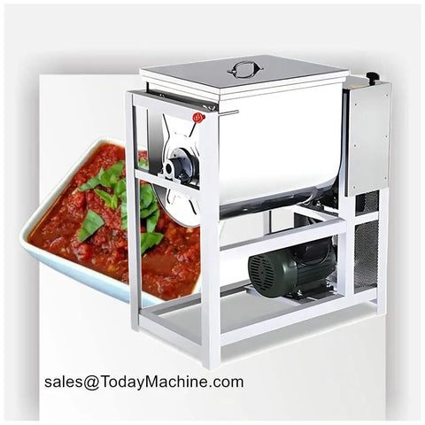 Industrial food mixer beside a dish of tomato sauce, showcasing the capabilities of the machine for blending ingredients.