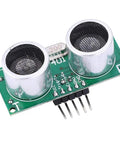 Top-Notch Ultrasonic Sensor Module With Temperature Compensation For Spot On Distance Sensing, green circuit board, silver sensors