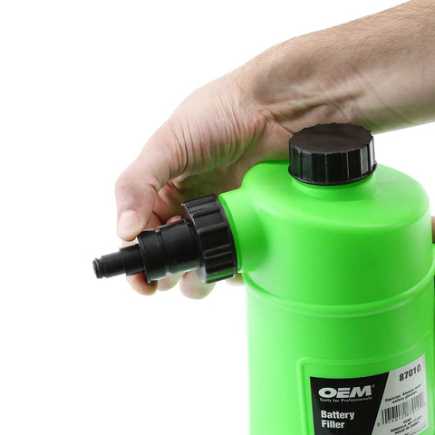 Hand holding Battery Water Filler Jug With Auto Shutoff Nozzle 2 Liter Distilled Water Bottle For Lead Acid Batteries Spill Proof Heavy Duty