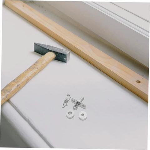 Heavy Duty Spring Loaded Pivot Shaft Set For Folding Screens Supports Wood Or Metal Door Hardware With Top Mounting Adjustments For Residential Or Office Installations A Solid Choice, hammer and metal hardware on a surface.