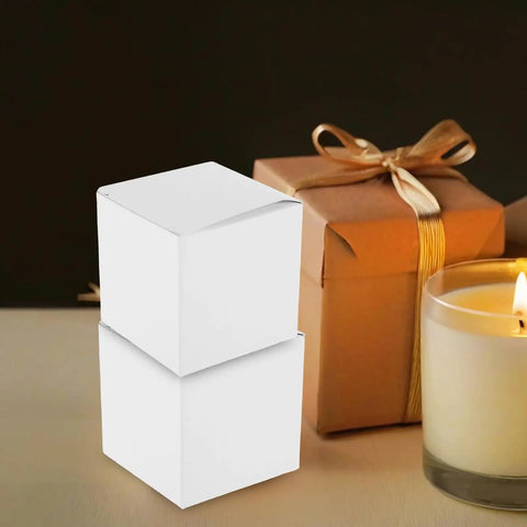 White Square Cardboard Boxes Set Of 10 Easy Assembly Packaging Boxes For Essential Oils Coffee Cups Candles And Gifts Giftable Multipurpose Small Business Packaging Supplies For Retail next to a candle and gift box.