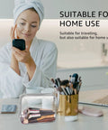 Woman using Three Pack Clear PVC Travel Toiletry Bags Set For Women And Men Waterproof See Through Organizer with makeup brushes.