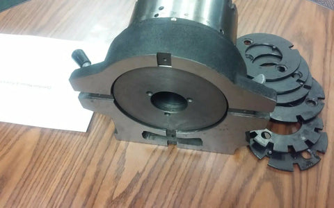 Six Inch Precision Machine Spacer With Adjustable Chuck And Six Masking Plates For Milling Drilling Jig Boring viewed from the side.