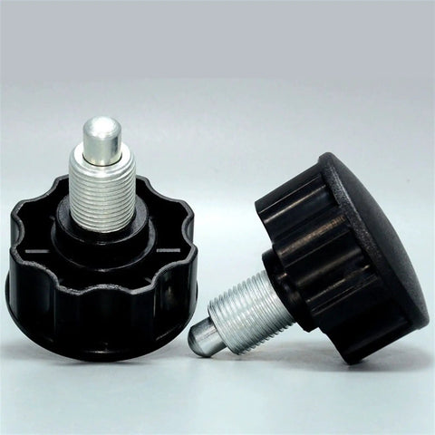 Heavy Duty M20 Indexing Plunger and Spring Loaded Locking Dowel Pin with Bulletproof Screw Grip for Zero Play Precision Alignment plus Rock Solid Industrial Positioning Includes One Full Sized Unit, close-up view of two pins with black plastic grips.