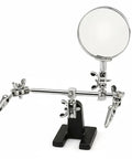 Heavy Duty Magnifying Glass Vise With Badass Rock Solid Grip And Fine Tuned Focus Lens For Electronics Repair Jewelry Crafting And Precision Bench Work on black base with adjustable clamps.