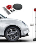 Park Like A Boss Smart LED Reversible Garage Stop Sign With Heavy Duty Base And Flashing Warning Signal For Easy No Sweat Setup and Smooth Daily Driveway Runs next to a car with visible parts.