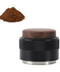 Top Tier 51Mm Black Coffee Distributor And Espresso Tamper For Baristas Stainless Steel Tool with wood top and coffee grounds.