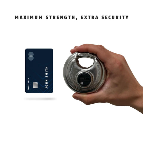 Person holding Heavy Duty Diskus Storage Padlock With Two Keys For Outdoor And Commercial Use next to credit card size comparison