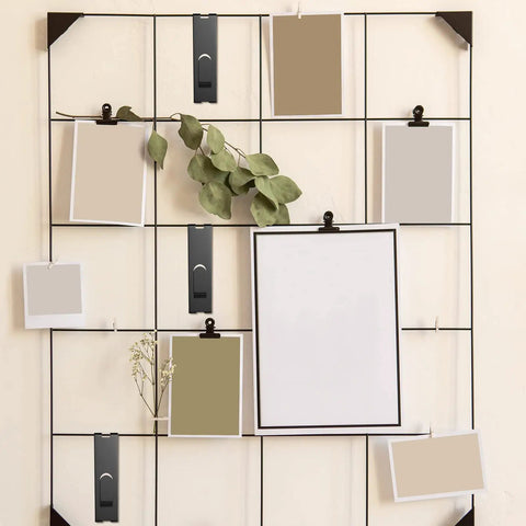 Grid wall panel with black 15 Pack Gridwall Notch Hooks Black Utility Hangers for display and organizing.