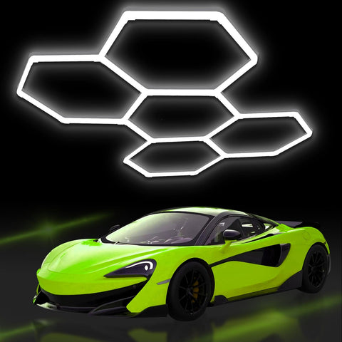Hexagon Garage Lights LED 25 Pack 220W 26400LM 6500K Daylight White Ceiling Lighting installed above a sports car