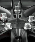 Close-up of Top Shelf 20 Pcs Slick Chrome Lug Bolts For Jeep And Dodge Wheel Setup on aluminum rim with 19mm hex.