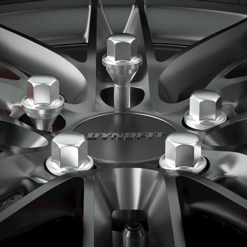 Close-up of Top Shelf 20 Pcs Slick Chrome Lug Bolts For Jeep And Dodge Wheel Setup on aluminum rim with 19mm hex.
