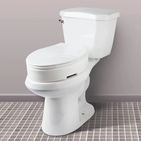 Hinged Elongated Toilet Seat Riser Delivers A Bold Three Point Five Inch Lift For Heavy Duty Three Hundred Pound Support No Sweat Installation And Easy Breezy Cleaning In Clean White