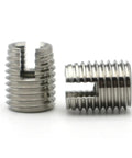 Heavy Duty Self Tapping Thread Inserts M2 To M16 In Carbon And Stainless Steel With Yellow Zinc Plated Or Silver Finish For Hardcore Thread Repair Jobs On Cars And Home Appliances Pack Of Two Awesome Gear close-up of two stainless steel thread inserts.