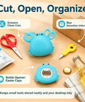 Magnetic Crab Shaped 4-in-1 Multi Tool Box Cutter with Bottle Opener and Handy Mini Scissors on wooden table