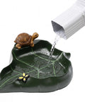Totally Slick Leaf Shaped Splash Block With Turtle Sculpture, showing green resin, 12x11 inches, used to divert downspout water.