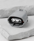 Heavy Duty 3 Pin Alternator Adapter Connector For Denso Toyota Lexus Kubota 16678-65830 90980-11349, gray plastic connector close-up.