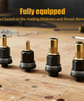 Heavy Duty Head Rivet Nut Tool Kit With 6 Pliers And 60 Carbon Steel Press-In Nuts For Fasteners Size M3 To M10 Makes Any DIY Job Super Easy And Smooth., four rivet nut tool heads on wood