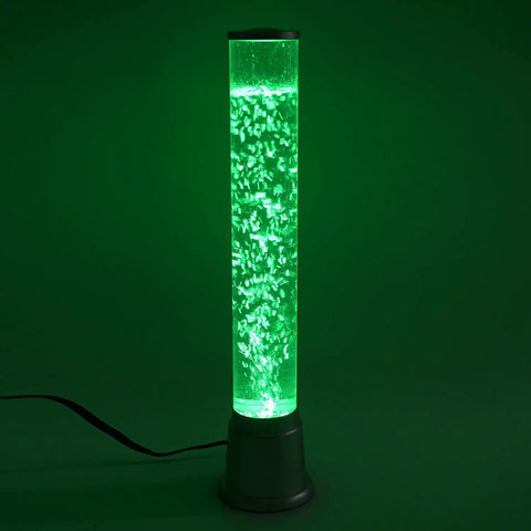 Bubble Tube Fish Lamp With 6 LED Color Changing Lights For A Soothing Vibe, glowing green with bubbles in a dark room.