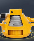 Rock Solid Spring Balancer Tool Hanger Rig Featuring Smooth Self Lock Pulley And Tangle Free Steel Cable, close-up of yellow steel pulley.