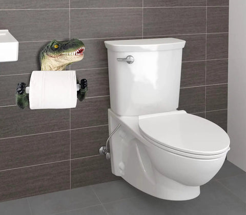 Dino Themed Toilet Paper Holder Adhesive Wall Mount in bathroom next to white toilet, kid-friendly decor with dinosaur design.