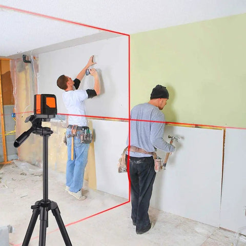 Two workers using a 50 Feet Self Leveling Laser Level With Horizontal And Vertical Cross Line Quick Pendulum Leveling System for wall alignment.