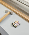 Emergency Pipe Repair Clamp DN20 110mm Waterproof Leak Sealer beside tools on workbench, heavy-duty construction