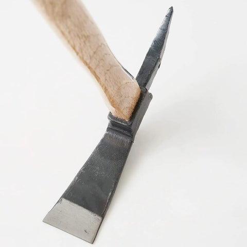 Close-up of One-Handed Pick Mattock For Garden Work Heavy Duty Cruciform Hand Tool showing metal head and wooden handle.