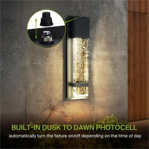 Bubble Glass Outdoor LED Wall Light 13 Inch Dusk to Dawn Sconce Dope Look, lit on exterior wall at dusk with photocell feature.