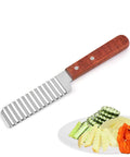 Crinkle cutter knife from Amazon with wooden handle and ridged stainless blade, front-angle view of slicing vegetables.