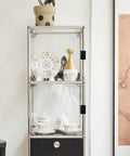 Glass cabinet with floral china, secured with 6 Pcs 1.57 Inch Glass Finger Edge Pulls For 5 To 6mm Thick Glass Doors