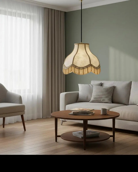 Ivory Jacquard Lamp Shade With Fringes, Scallop Bell Shape, shown in living room with modern decor, 13 Inch Wide Bottom, 9.5 Inch High.