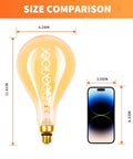 Size comparison showing dimmable LED oversized Edison bulb with amber glass, E26 base next to a smartphone for scale.