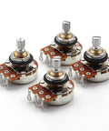 Four Bourns 500K short-shaft audio-taper potentiometers with knurled metal shafts on orange PCBs.