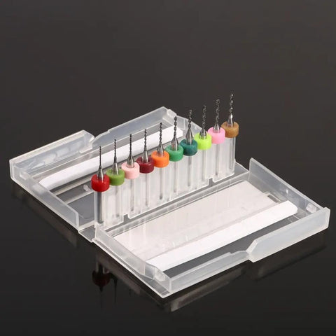 Ten Piece Set Of 0.6 To 1.5mm Pro Grade Carbide Drill Bits in a clear case, various colored handles for PCB CNC milling and precision work.