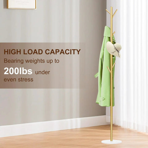 Gold Metal Freestanding Coat Rack With Eight Hooks And Marble Base in a room, displaying coat and hat on hooks.