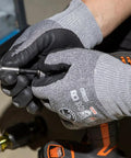 Close-up of hands assembling Compact 3-Piece Tool Set With Mini Ratchet, 12-In-1 Stubby Multi-Bit Driver, and 5-In-1 SAE Socket Kit.