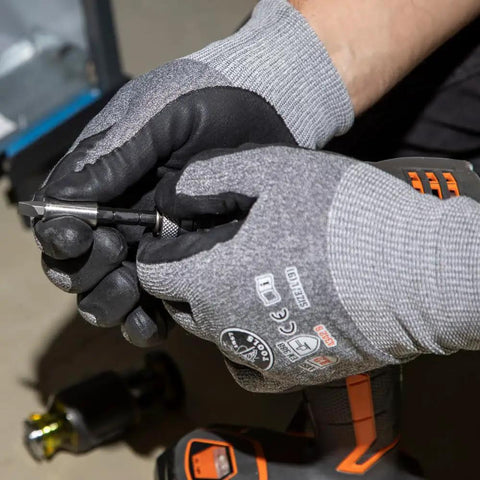 Close-up of hands assembling Compact 3-Piece Tool Set With Mini Ratchet, 12-In-1 Stubby Multi-Bit Driver, and 5-In-1 SAE Socket Kit.