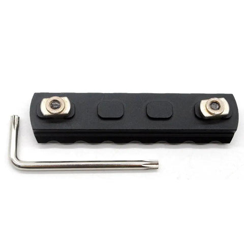 7 Slot M Rail System Kit With Chamfered Slots And Beveled Ends For Smooth Fit, Aircraft Grade 6061 T6 Aluminum, Anodized Finish, Ready For Tac Accessories, Includes Quincunx Screws And Wrench, shown with quincunx screws and wrench.