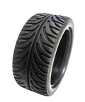Close-up of 65mm hard drift tire for 1/10 scale RC cars, high performance rubber, 0 and 3 degree camber options.