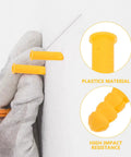 Yellow Plastic Wall Plugs Kit With Self Drilling Anchors shown being installed in plasterboard by gloved hand