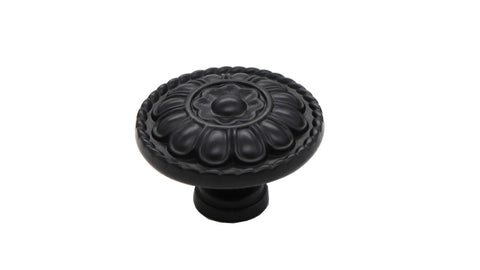 8 Pack Black Vintage Dresser Drawer Knobs Pulls For Cabinets And Cupboards With 1.25 Inch Single Hole Hardware Zinc Alloy Handle Set Includes 16 Screws In Two Lengths 25mm And 40mm front view showing intricate design.