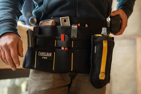 Boss Level Jobsite Utility Waist Pack Featuring Detachable Sixteen Oz Hydration Flask And Eight Rugged Tool Pouches, showing tool organization and storage.