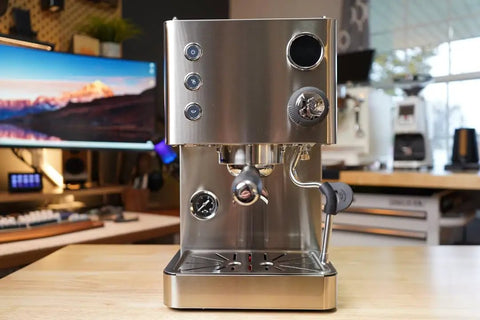 Top Tier Dual Boiler Espresso Maker With Smart Thermoblock And Precise PID Temp Control featuring a 58mm portafilter in glossy stainless steel.