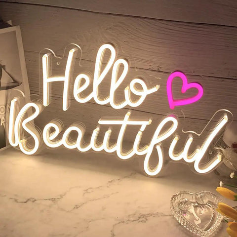 Hello Beautiful Neon Sign For Girl's Room Wall Decor With Dimmer Switch Romantic Neon Light For Weddings Valentine's Day Parties Gifts 12V Warm White With Power Adapter Included glowing on a table.